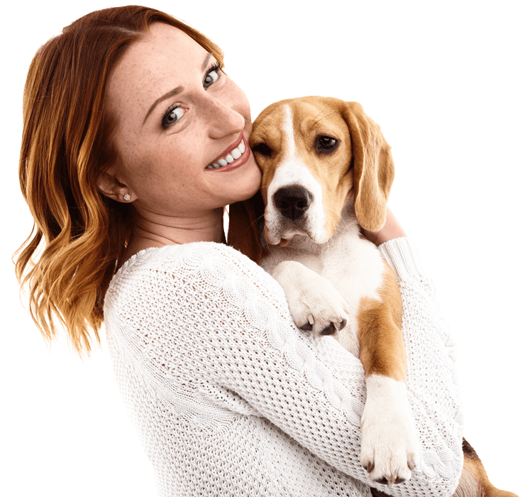 Woman holding puppy dog